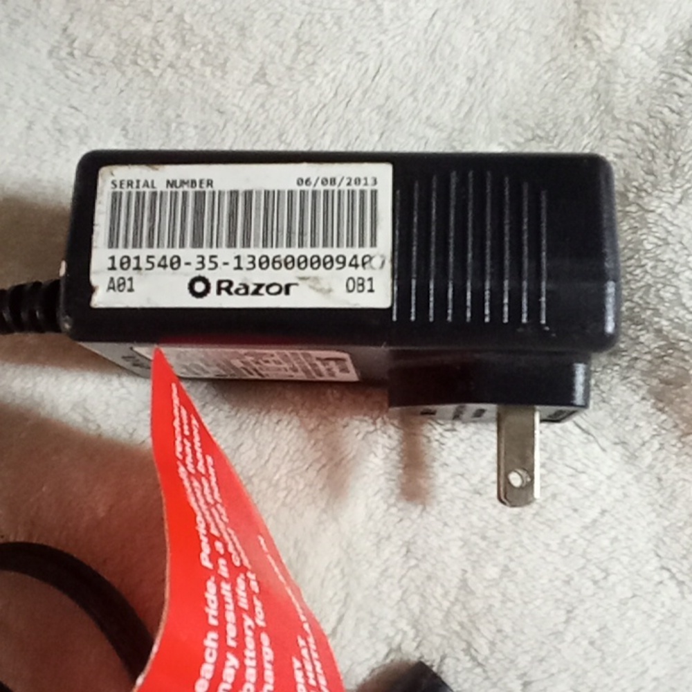 Razor Black Charger with Red Tag